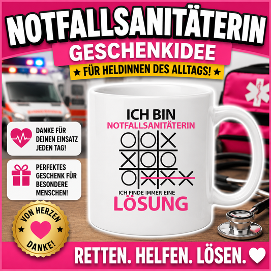 Lustige Tasse für eine Notfallsanitäterin mit dem Spruch „Ich bin Notfallsanitäterin, ich finde immer eine Lösung“ – originelle Geschenkidee für den Berufsalltag.